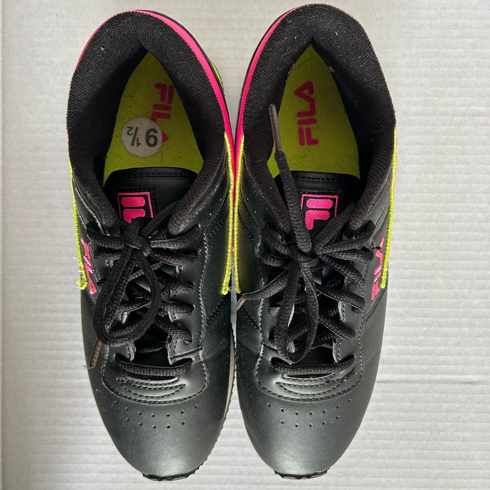 Black FILA size 9.5 tennis shoes. Worn only once.